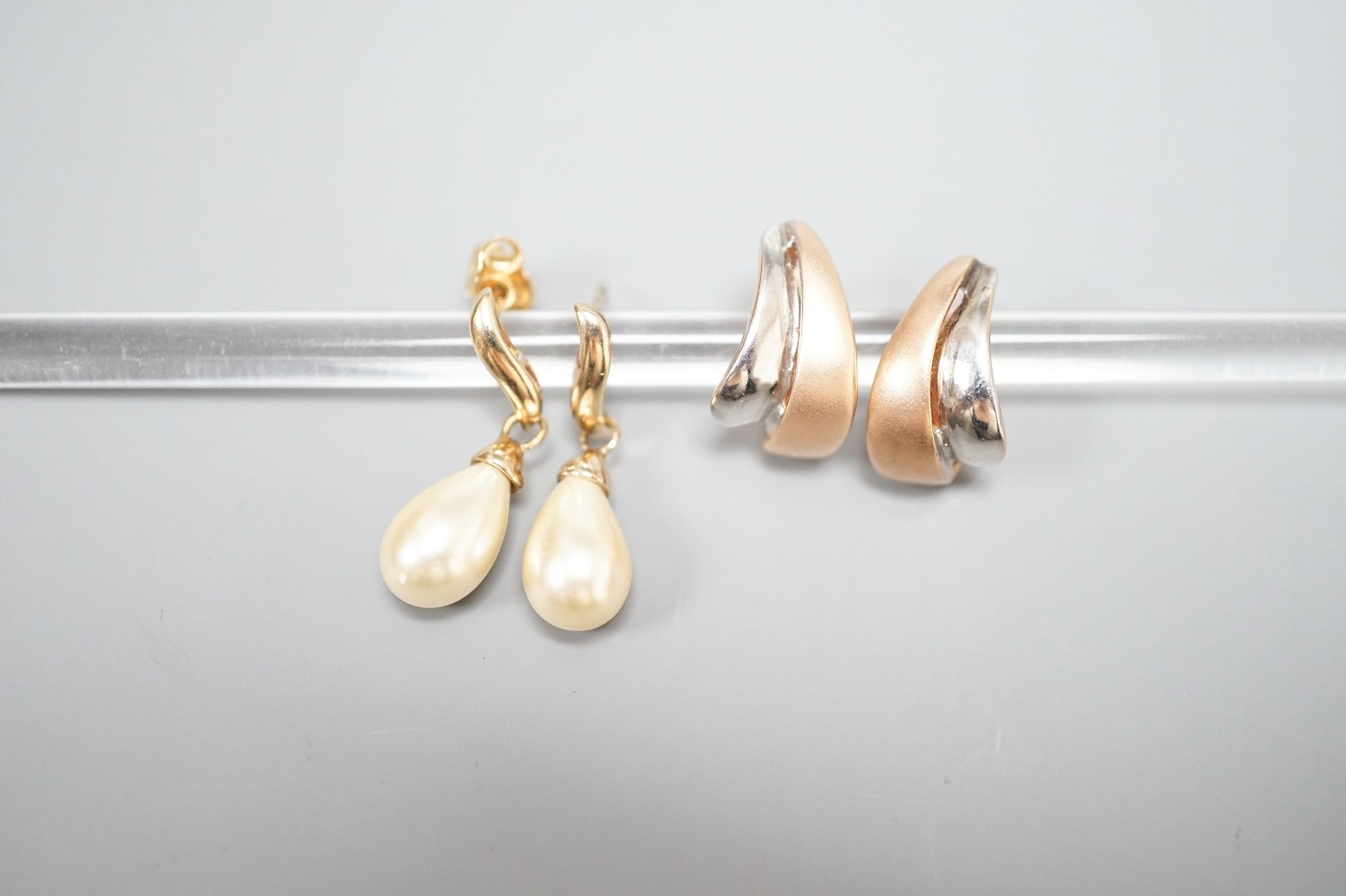 A modern pair of two colour 14k earrings, 4.1 grams and a pair of simulated pearl set earrings.